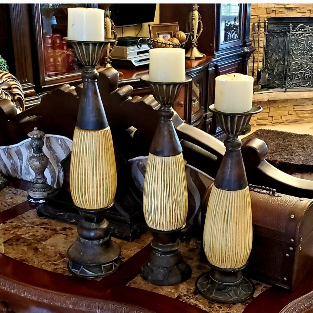 3 tall iron candels stick